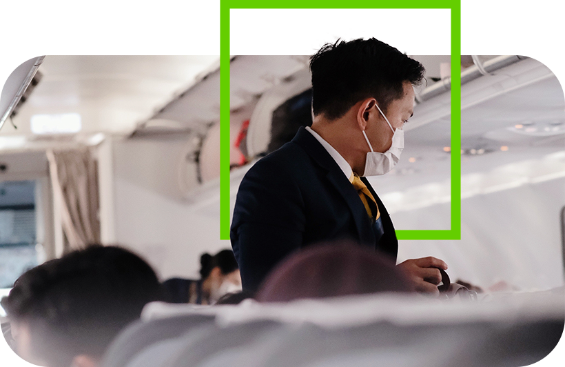 A flight attendant on a plane